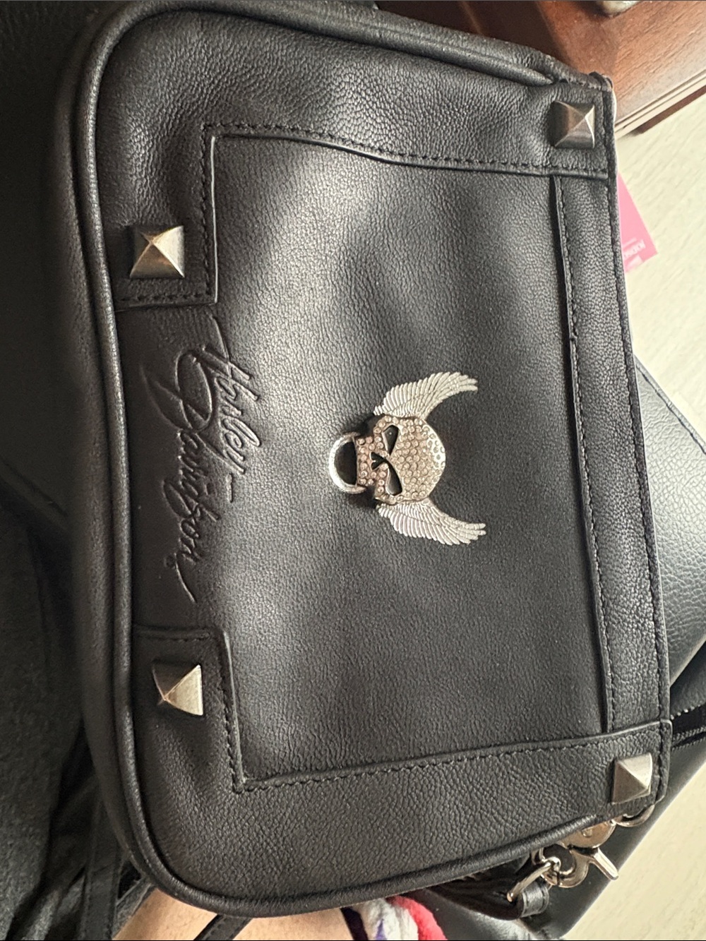 Harley Davidson Leather Crossbody Bag with Winged Skull Hardware - Black